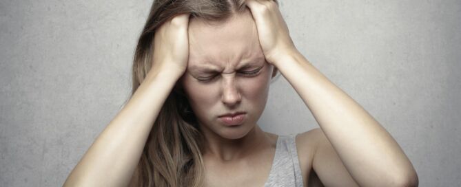 women having headache