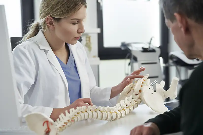 caucasian-female-doctor-talking-with-patient-about